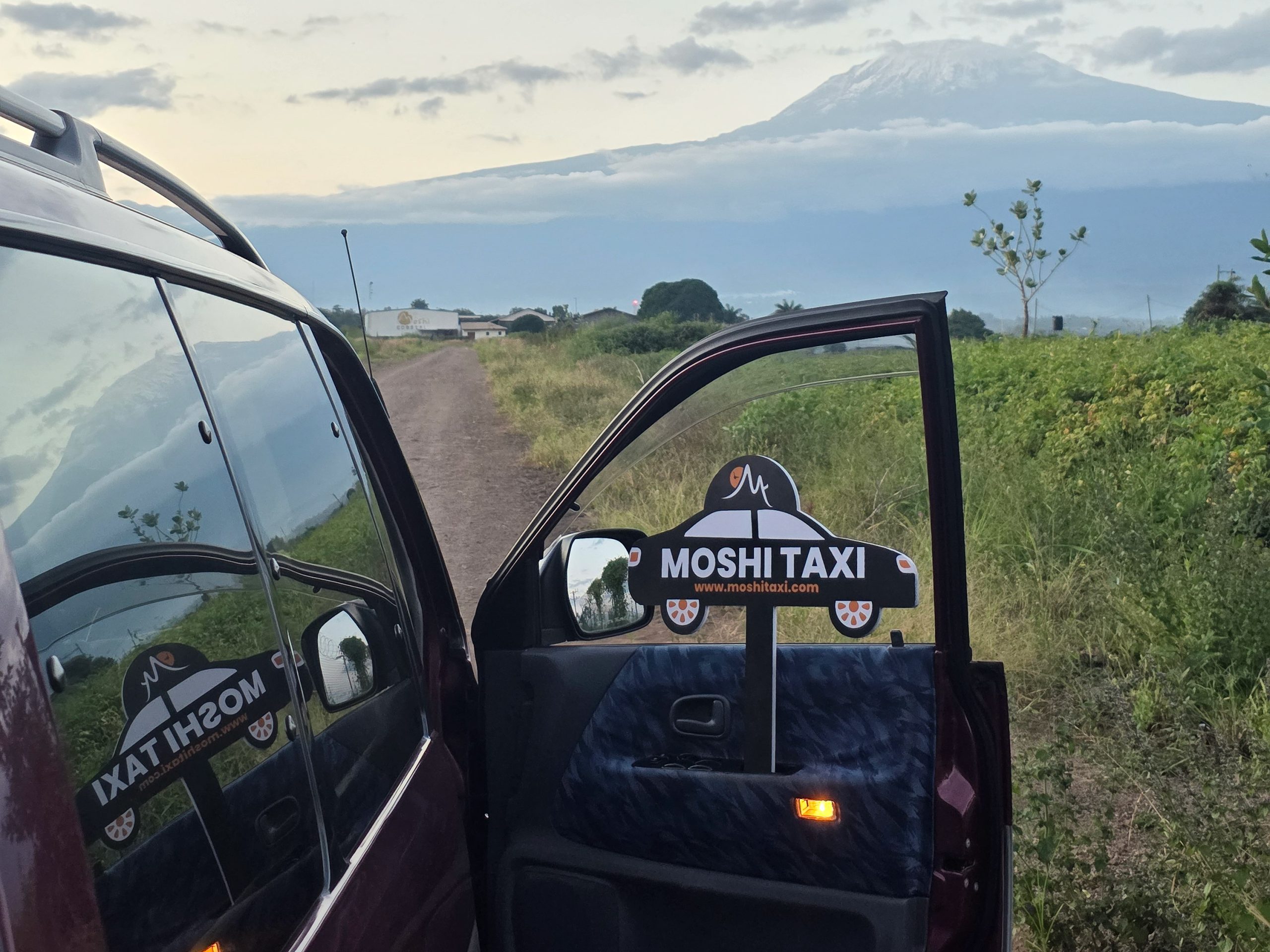 Moshi Taxi Looking at Kilimanjaro Mountain